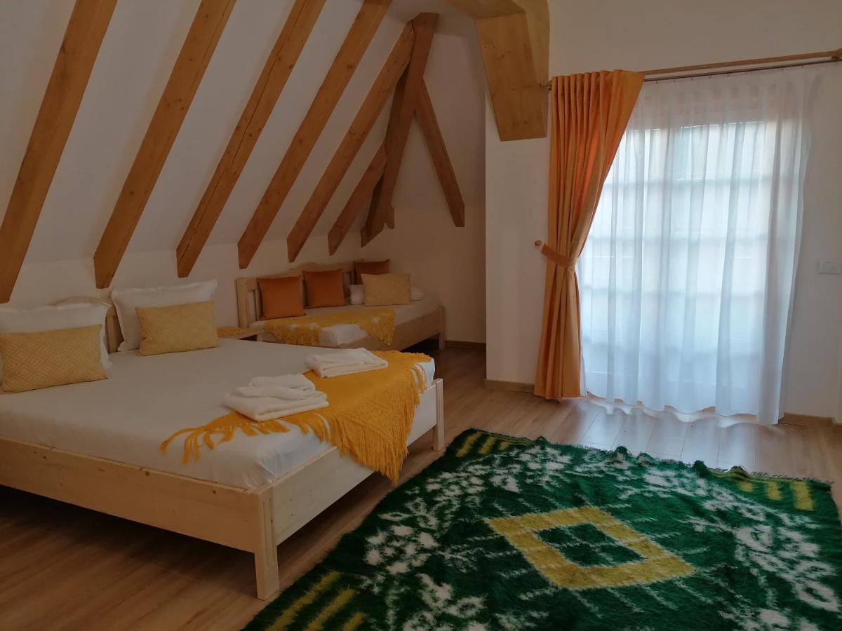 Pensiunea Casuta Din Deal Majszin Szoba fotó