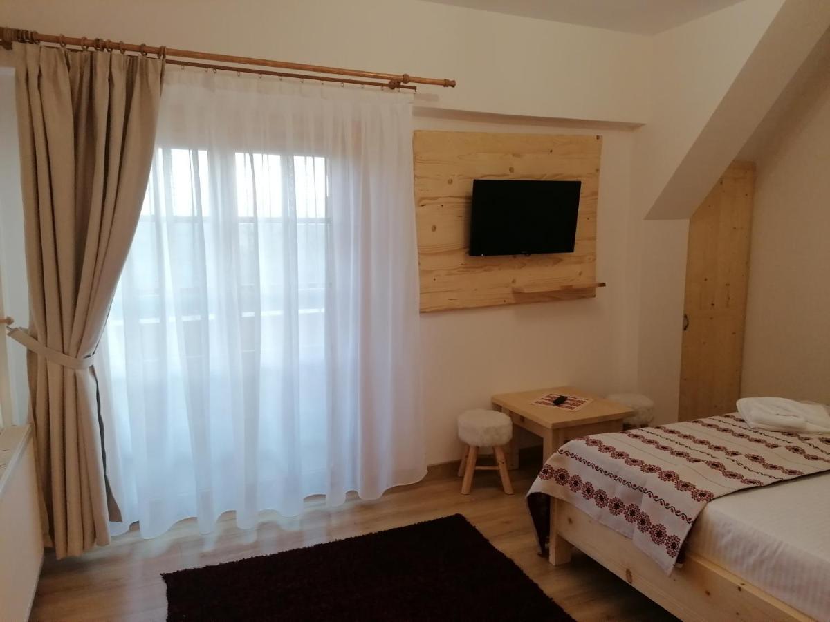 Pensiunea Casuta Din Deal Majszin Szoba fotó